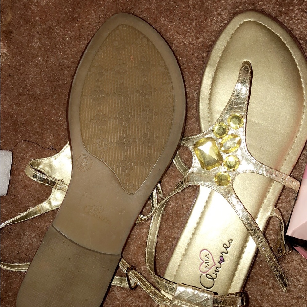 Gold sandals with studs